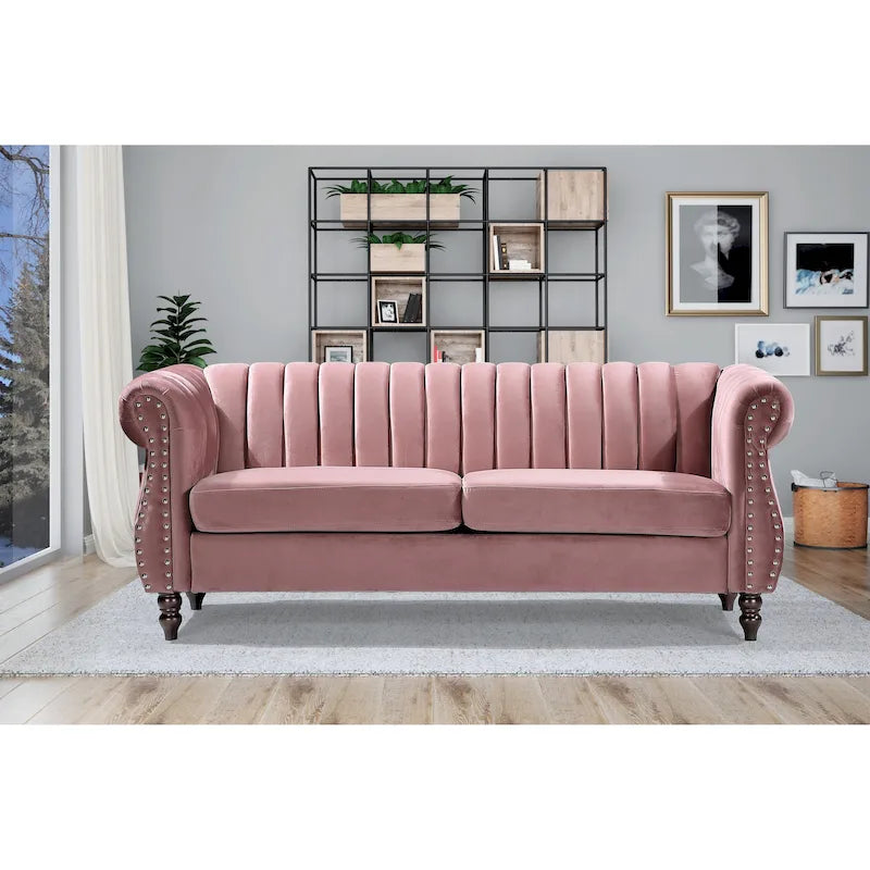 Canapé Chesterfield en velours avec accoudoirs roulés classiques et dossier capitonné pour salon élégant