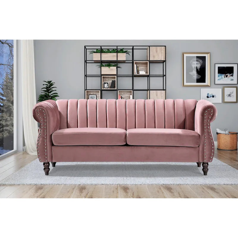 Canapé Chesterfield en velours avec accoudoirs roulés classiques et dossier capitonné pour salon élégant