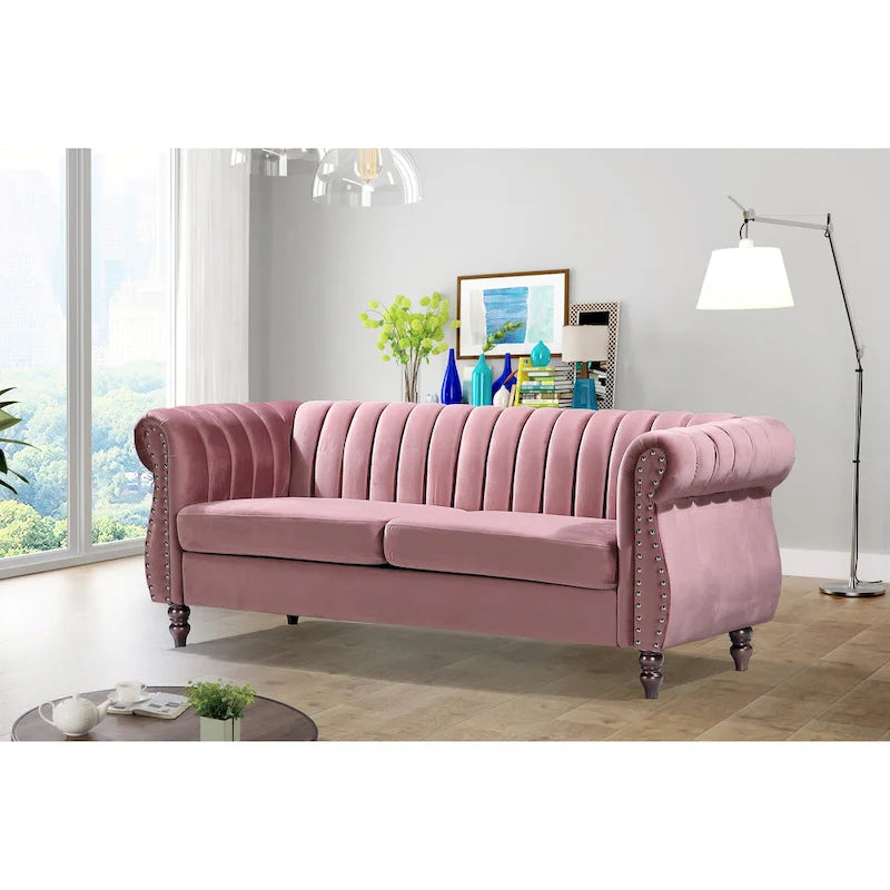 Canapé Chesterfield en velours avec accoudoirs roulés classiques et dossier capitonné pour salon élégant