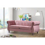 Canapé Chesterfield en velours avec accoudoirs roulés classiques et dossier capitonné pour salon élégant