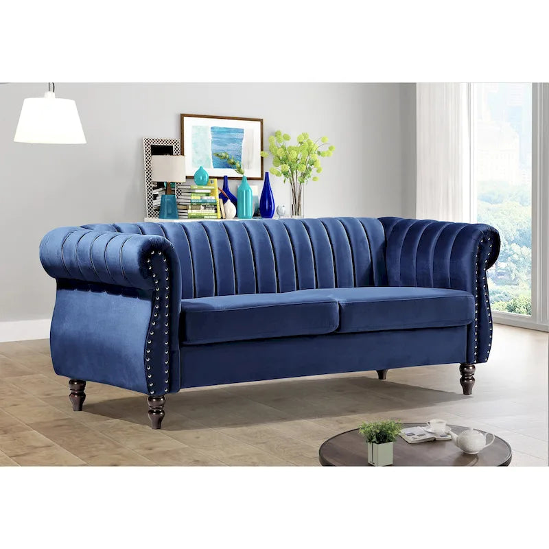 Canapé Chesterfield en velours avec accoudoirs roulés classiques et dossier capitonné pour salon élégant