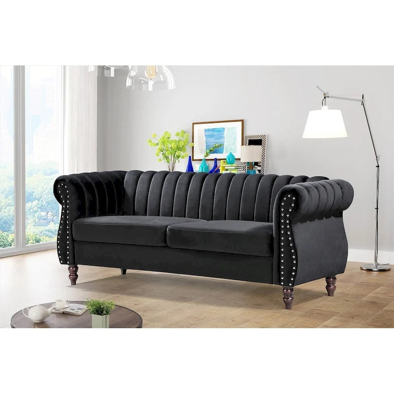 Canapé Chesterfield en velours avec accoudoirs roulés classiques et dossier capitonné pour salon élégant