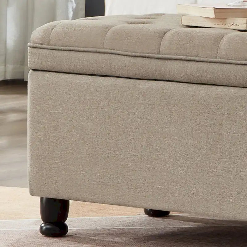 Banc de rangement capitonné avec pieds fuselés en bois