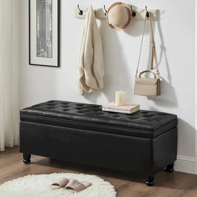 Banc de rangement capitonné avec pieds fuselés en bois