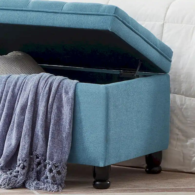 Banc de rangement capitonné avec pieds fuselés en bois